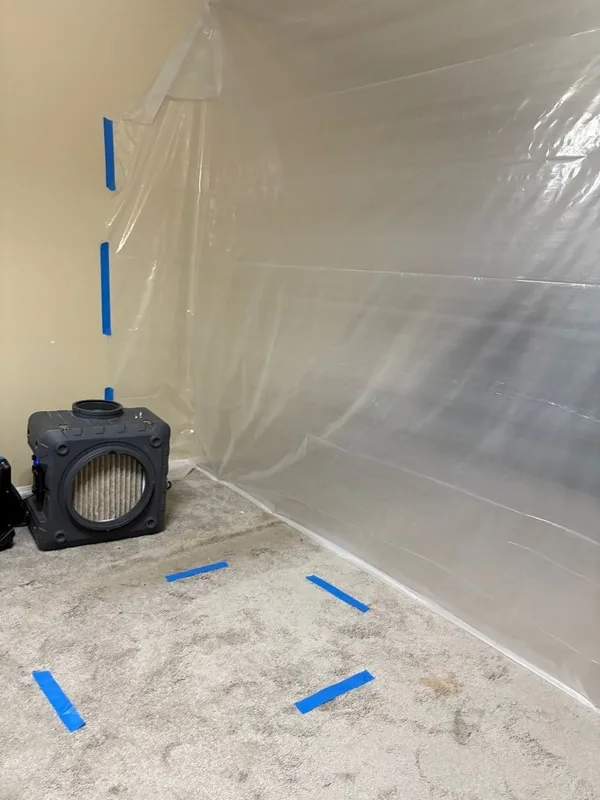 Ceiling leak air mover containment