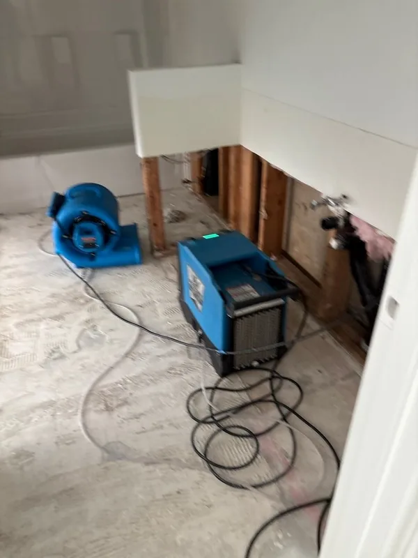 Basement water damage dehumidifier running